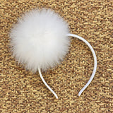 HEADBAND WITH POM POM