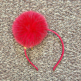 HEADBAND WITH POM POM