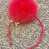 HEADBAND WITH POM POM