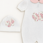 Coordinato Baby Lord su sfondo bianco caldo naturale