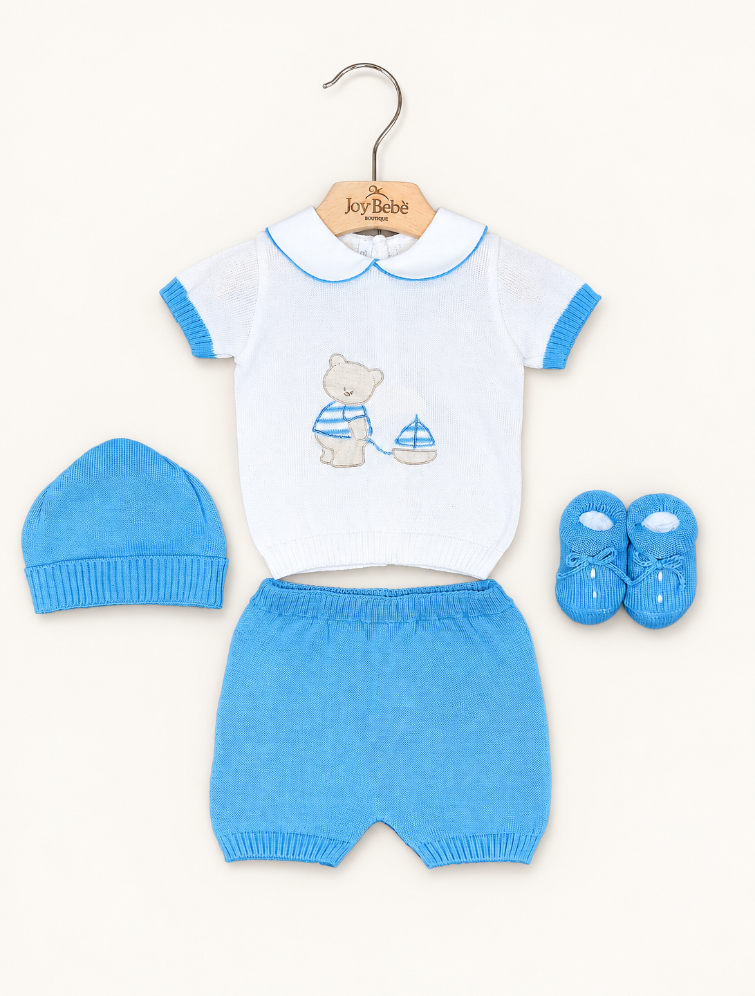 Coordinato Baby Lord su sfondo bianco caldo naturale