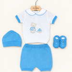 Coordinato Baby Lord su sfondo bianco caldo naturale