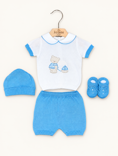 Coordinato Baby Lord su sfondo bianco caldo naturale
