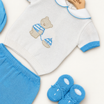 Coordinato Baby Lord su sfondo bianco caldo naturale