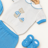 Coordinato Baby Lord su sfondo bianco caldo naturale