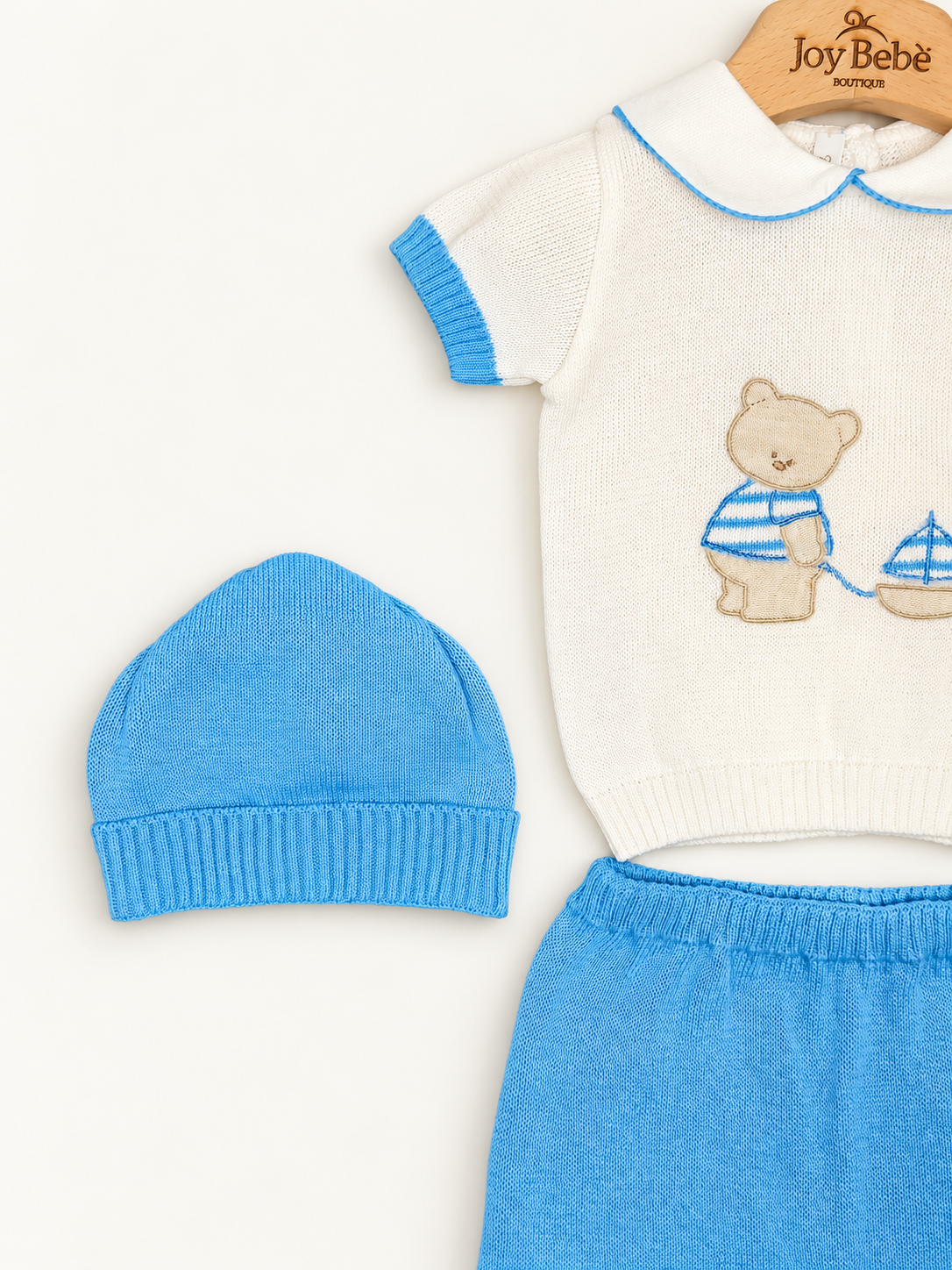 Coordinato Baby Lord su sfondo bianco caldo naturale
