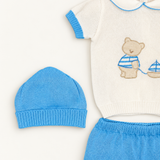 Coordinato Baby Lord su sfondo bianco caldo naturale