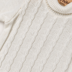 Maglione Ambaraba' su sfondo bianco caldo