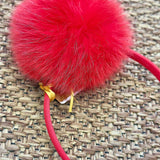 HEADBAND WITH POM POM